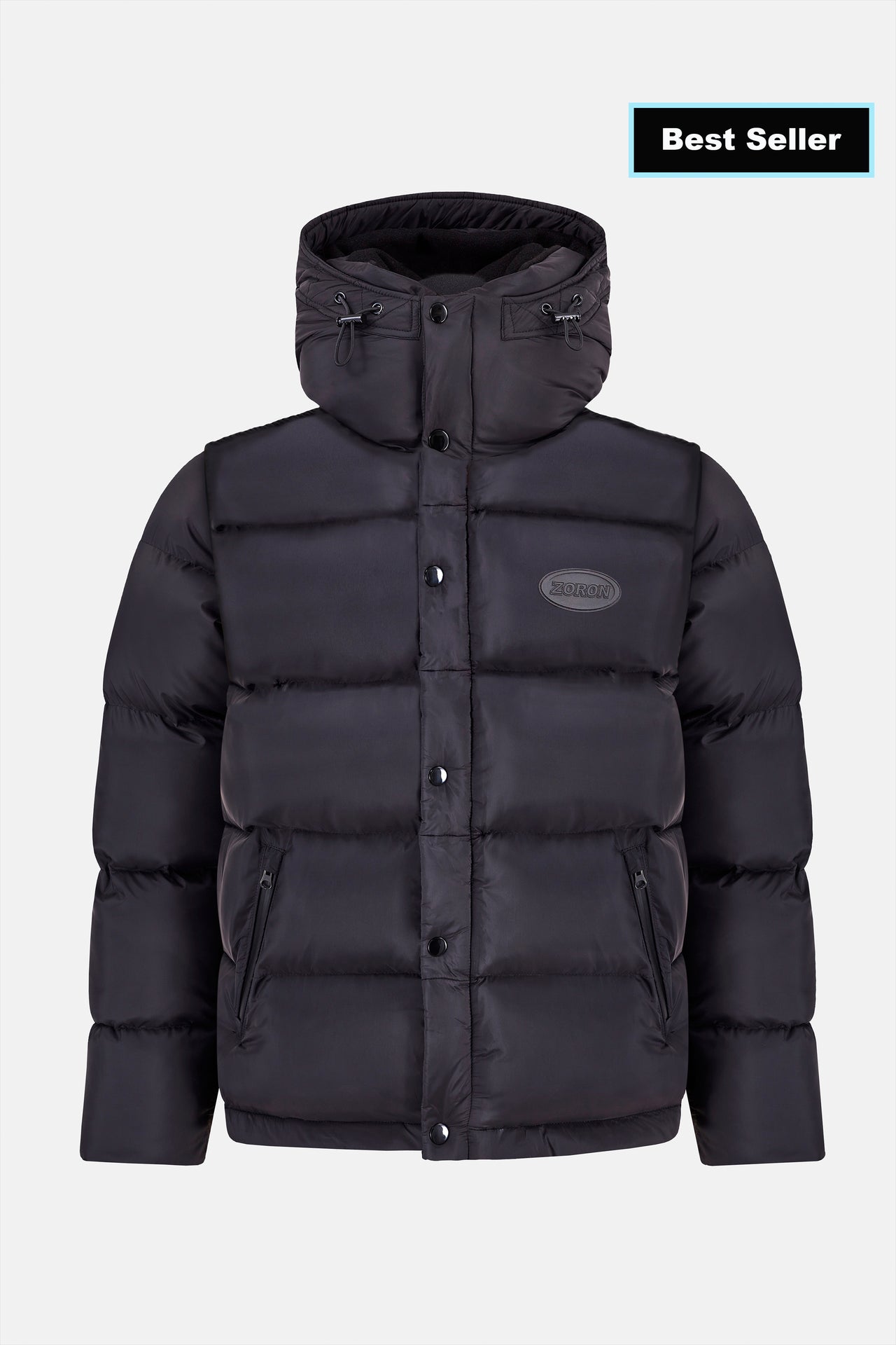 A black puffer jacket with a high funnel collar, detachable sleeves, and a signature zip closure with snap button placket. It features two exterior pockets with zip closure and one interior pocket.